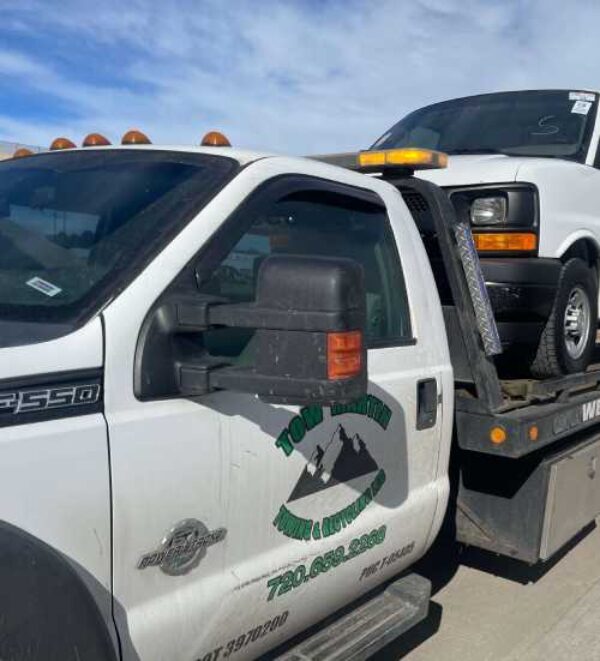 Van on tow truck